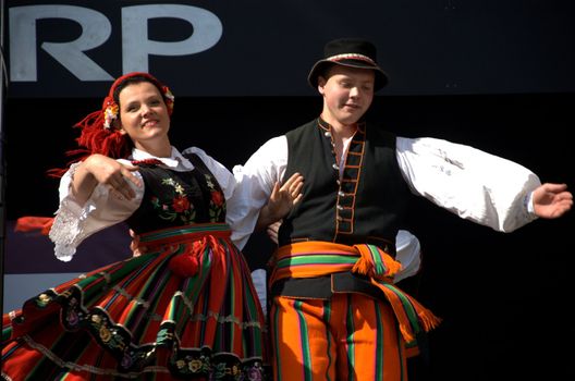 WROCLAW, POLAND - JUNE 15:  Members of Folk Dance group "Wroclaw" perform on Euro 2012 fanzone stage on June 15, 2012 in Wroclaw.  