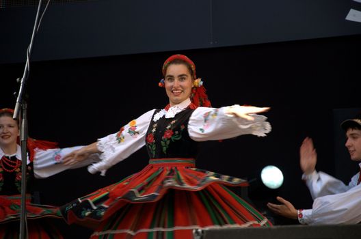 WROCLAW, POLAND - JUNE 15:  Members of Folk Dance group "Wroclaw" perform on Euro 2012 fanzone stage on June 15, 2012 in Wroclaw.  