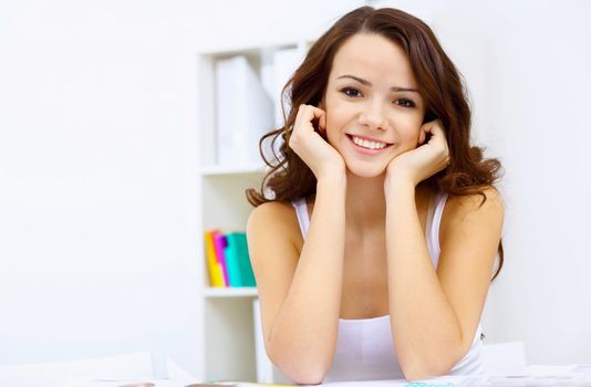 Student girl studying her lessons at home