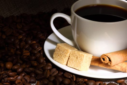 Image of coffee beans and white cup