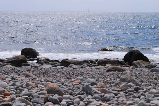 Mølen is Norway's largest beach of rolling stones, and is a part of Vestfoldraet: the terrain left behind after the end of the most recent Ice age around 10,000 years ago. The wind and sea have lashed the landscape of Mølen for thousands of years. The area is famous for it's Viking graves. In 2008 the first UNESCO Geo park (Gea Norveciga Geopark) in the Nordic countries was opened at Mølen.