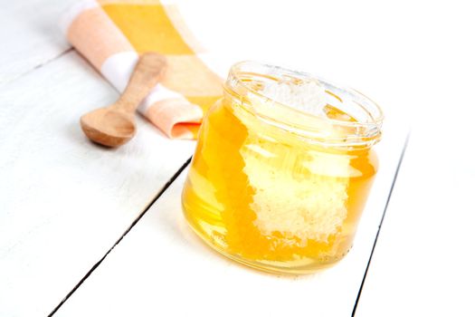 honey with a wooden spoon