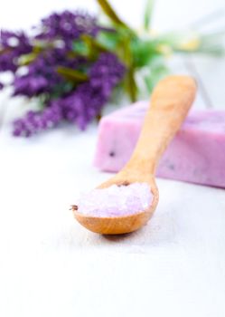 Lavender bath salt on wooden spoon