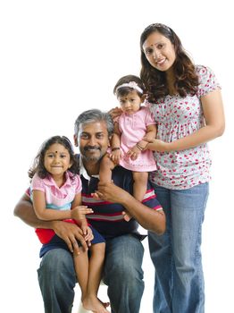 Happy modern Indian family portrait on white background