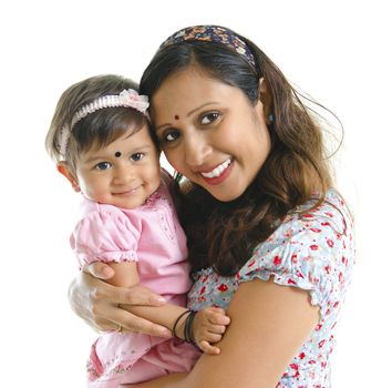 Happy modern Indian mother hugging her daughter isolated on white background