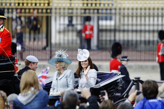 LONDON, UK - June 16: The Duchess of Cambridge, the Duchess of Cornwall and Prince Harry during Trooping the Colour ceremony, on June 16, 2012 in London. Trooping the Colour which takes place every year in June to officialy celebrate the sovereign birthday.