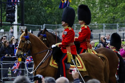 LONDON, UK - June 16: Trooping the Colour ceremony on the Mall and at Buckingham Palace, on June 16, 2012 in London. Trooping the Colour takes place every year in June to officialy celebrate the sovereign birthday.