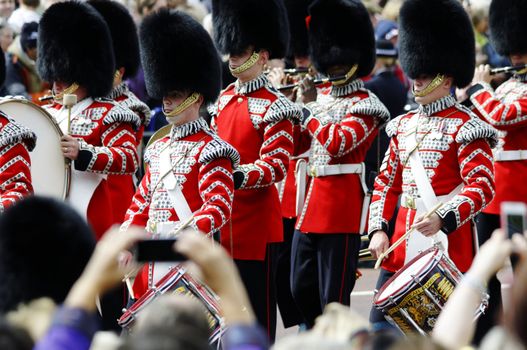 LONDON, UK - June 16: Trooping the Colour ceremony on the Mall and at Buckingham Palace, on June 16, 2012 in London. Trooping the Colour takes place every year in June to officialy celebrate the sovereign birthday.