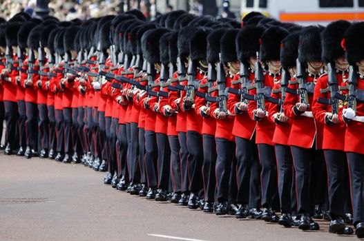 LONDON, UK - June 16: Trooping the Colour ceremony on the Mall and at Buckingham Palace, on June 16, 2012 in London. Trooping the Colour takes place every year in June to officialy celebrate the sovereign birthday.