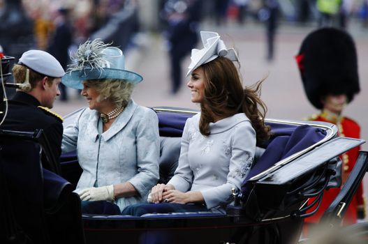 LONDON, UK - June 16: The Duchess of Cambridge, the Duchess of Cornwall and Prince Harry during Trooping the Colour ceremony, on June 16, 2012 in London. Trooping the Colour which takes place every year in June to officialy celebrate the sovereign birthday.