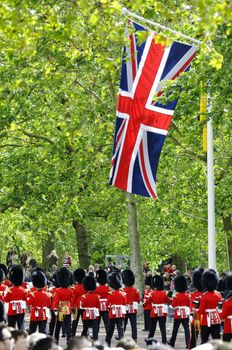 LONDON, UK - June 16: Trooping the Colour ceremony on the Mall and at Buckingham Palace, on June 16, 2012 in London. Trooping the Colour takes place every year in June to officialy celebrate the sovereign birthday.