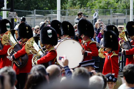 LONDON, UK - June 16: Trooping the Colour ceremony on the Mall and at Buckingham Palace, on June 16, 2012 in London. Trooping the Colour takes place every year in June to officialy celebrate the sovereign birthday.