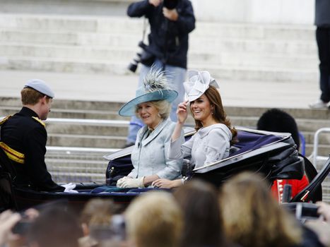 LONDON, UK - June 16: The Duchess of Cambridge, the Duchess of Cornwall and Prince Harry during Trooping the Colour ceremony, on June 16, 2012 in London. Trooping the Colour which takes place every year in June to officialy celebrate the sovereign birthday.