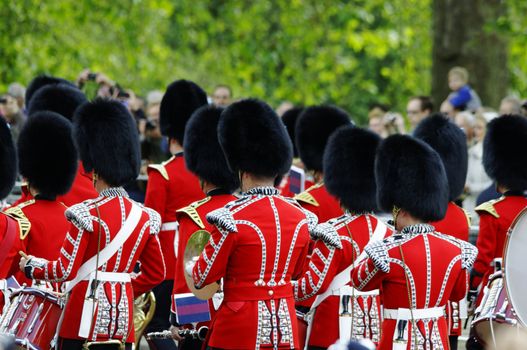 LONDON, UK - June 16: Trooping the Colour ceremony on the Mall and at Buckingham Palace, on June 16, 2012 in London. Trooping the Colour takes place every year in June to officialy celebrate the sovereign birthday.