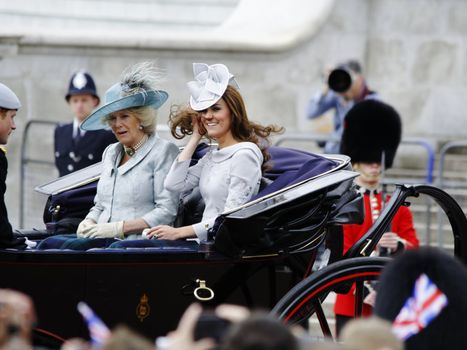 LONDON, UK - June 16: The Duchess of Cambridge, the Duchess of Cornwall and Prince Harry during Trooping the Colour ceremony, on June 16, 2012 in London. Trooping the Colour which takes place every year in June to officialy celebrate the sovereign birthday.