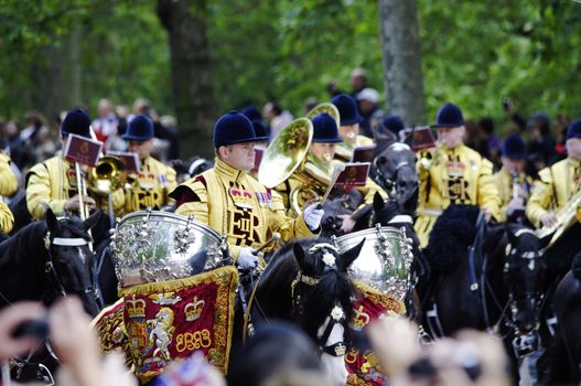 LONDON, UK - June 16: Trooping the Colour ceremony on the Mall and at Buckingham Palace, on June 16, 2012 in London. Trooping the Colour takes place every year in June to officialy celebrate the sovereign birthday.