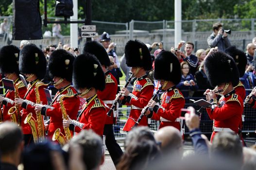 LONDON, UK - June 16: Trooping the Colour ceremony on the Mall and at Buckingham Palace, on June 16, 2012 in London. Trooping the Colour takes place every year in June to officialy celebrate the sovereign birthday.