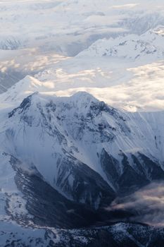 Snow covered mountain peaks perfect for heli-skiing in British Columbia, Canada.