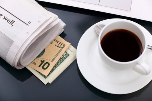 Image of business table with a cup of coffee and norebook