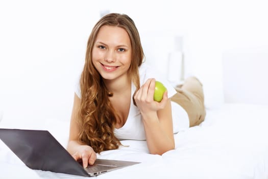 Portrait of a young woman with notebook