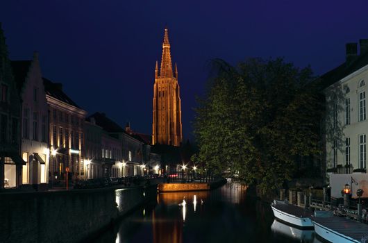 Night Shot of the famous Church of Our Lady in Bruges, Belgium.