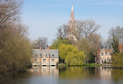 Minnewaters in Bruges with the Church of Our Lady at the back.