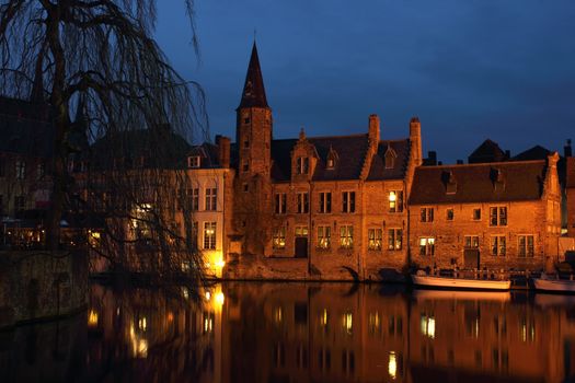 Late evening shot of Rozenhoedkaai in the old city Bruges in Belgium.