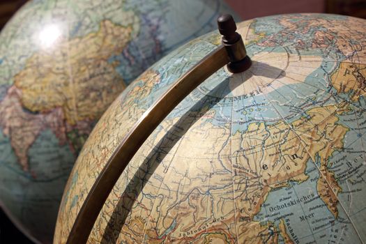 Vintage Globes with the concept of traveling and exploring new places.