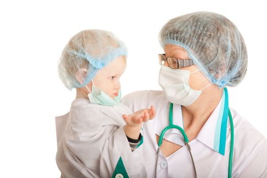 doctor and child dressed as a doctor