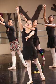 Group of four young Black and Latina dance students