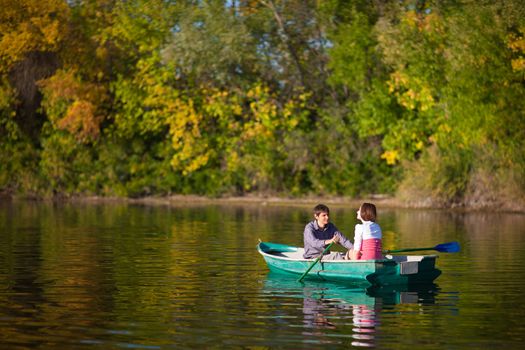 couple in a boat outdoors