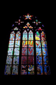 a stained-glass window in the St. Vitus cathedral. praha