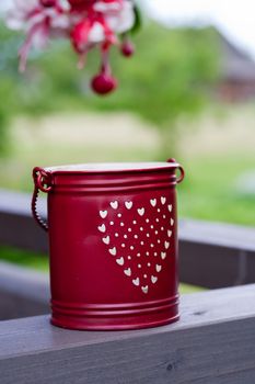 small red bucket for candle