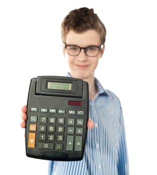 Young boy showing digital calculator to camera. All on white background