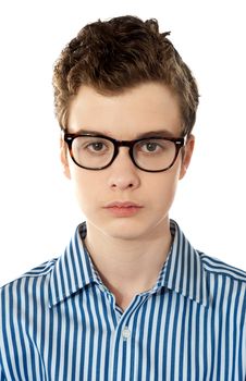 Closeup of a boy wearing glasses isolated over white