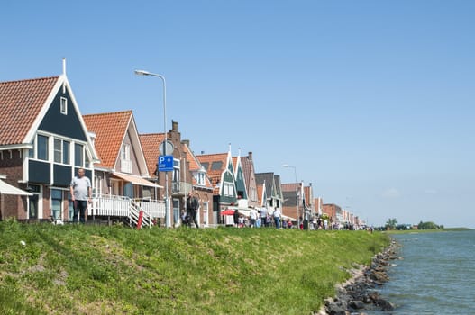 VOLENDAM, HOLLAND - MAY 28: Main street that connects Volendam to the village of Edam. May 28, 2012 in Volendam.