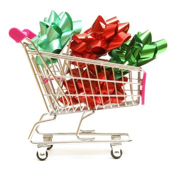 A shopping cart is full of christmas bows for the holiday spender.