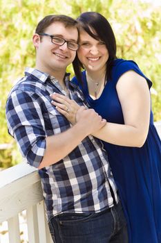 Attractive Young Couple Having Fun Outside in the Park Portrait.