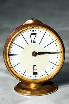 the old clock, alarm clock on the table