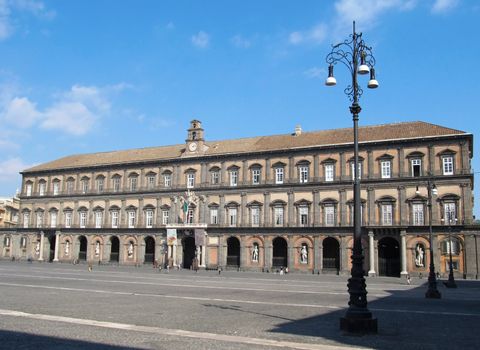 Royal palace facade on Piazza del Plebiscito in Naples, Italy.