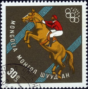 MONGOLIA - CIRCA 1964: a stamp printed by MONGOLIA shows an equestrian competition, series "XVIII Summer Olympic Games, Tokyo, 1964", circa 1964
