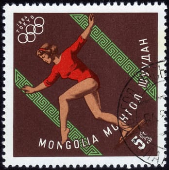 MONGOLIA - CIRCA 1964: A stamp printed in MONGOLIA shows Gymnastics women's with the inscription "Tokyo, 1964",  series "XVIII Summer Olympic Games, Tokyo, 1964", circa 1964