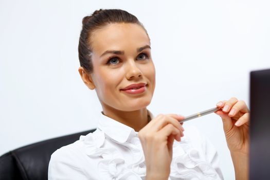 Portrait of young successful businesswoman in the office