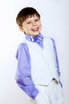 Portrait of a little boy dressed for a celebration