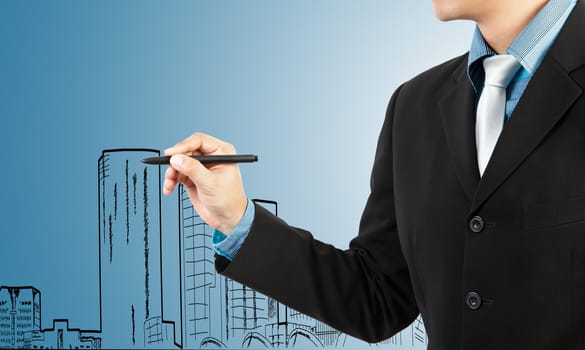 business man draw building and cityscape