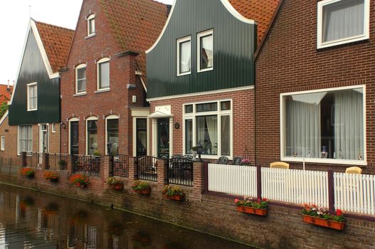 Holland, Volendam (Amsterdam), typical dutch stone houses and a water canal