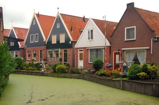 Holland, Volendam (Amsterdam), typical dutch stone houses and a water canal