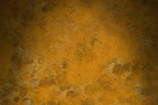 Rusty grungy background texture lit dramatically from above