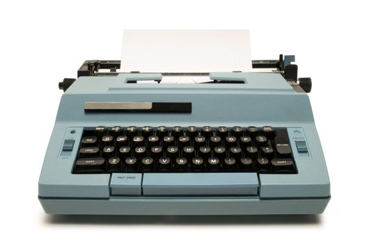 Blue electric typewriter isolated on a white background