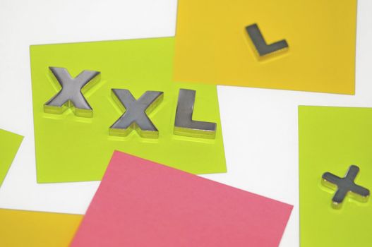 xxl sign, colored labels on the artistic shot